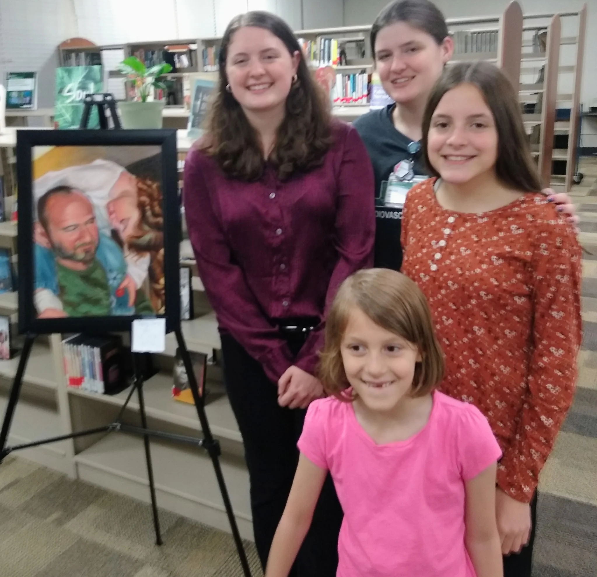 abby standing with her sisters.