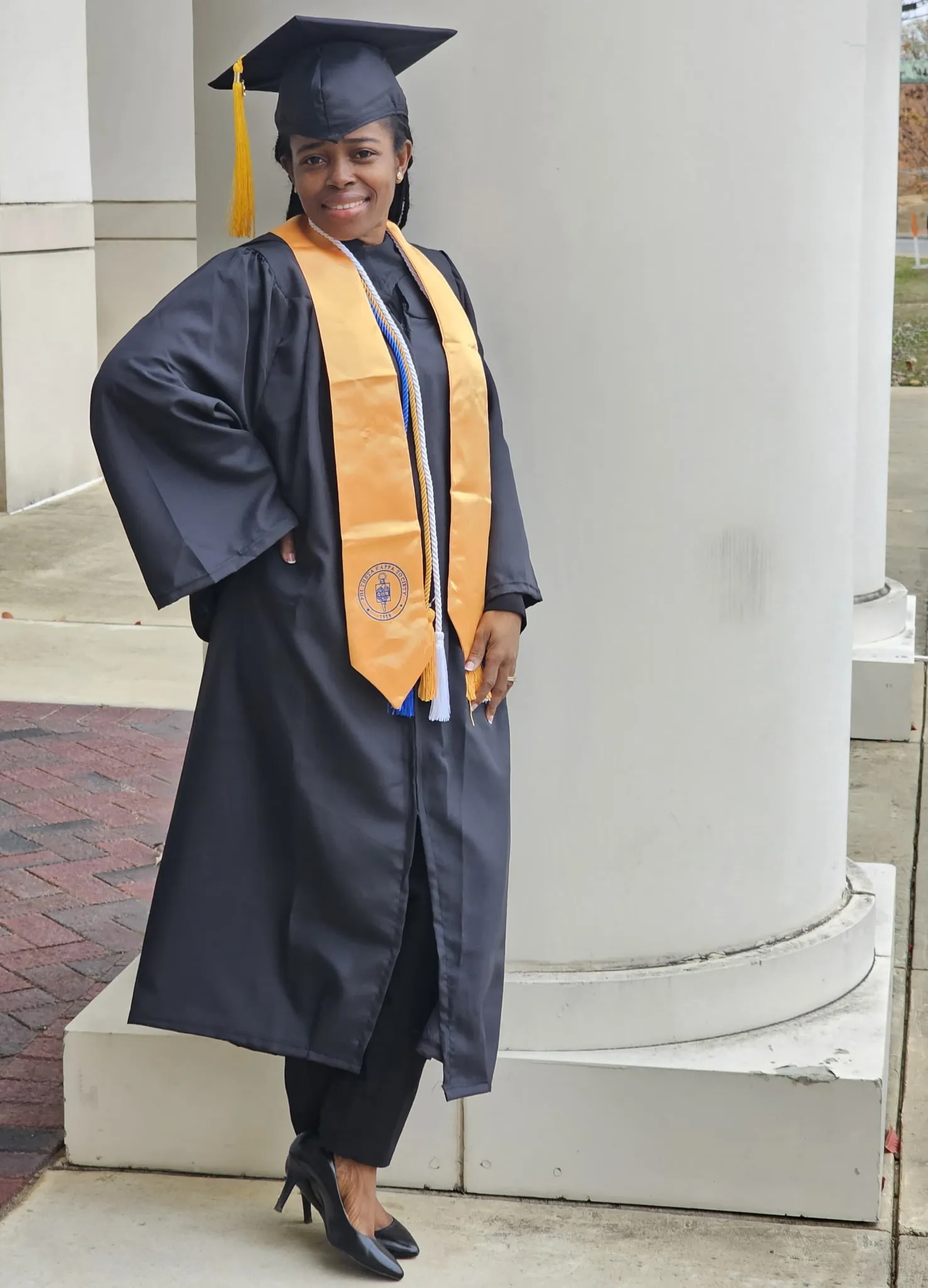 a girl sitting on the lawson state commmunity college bench