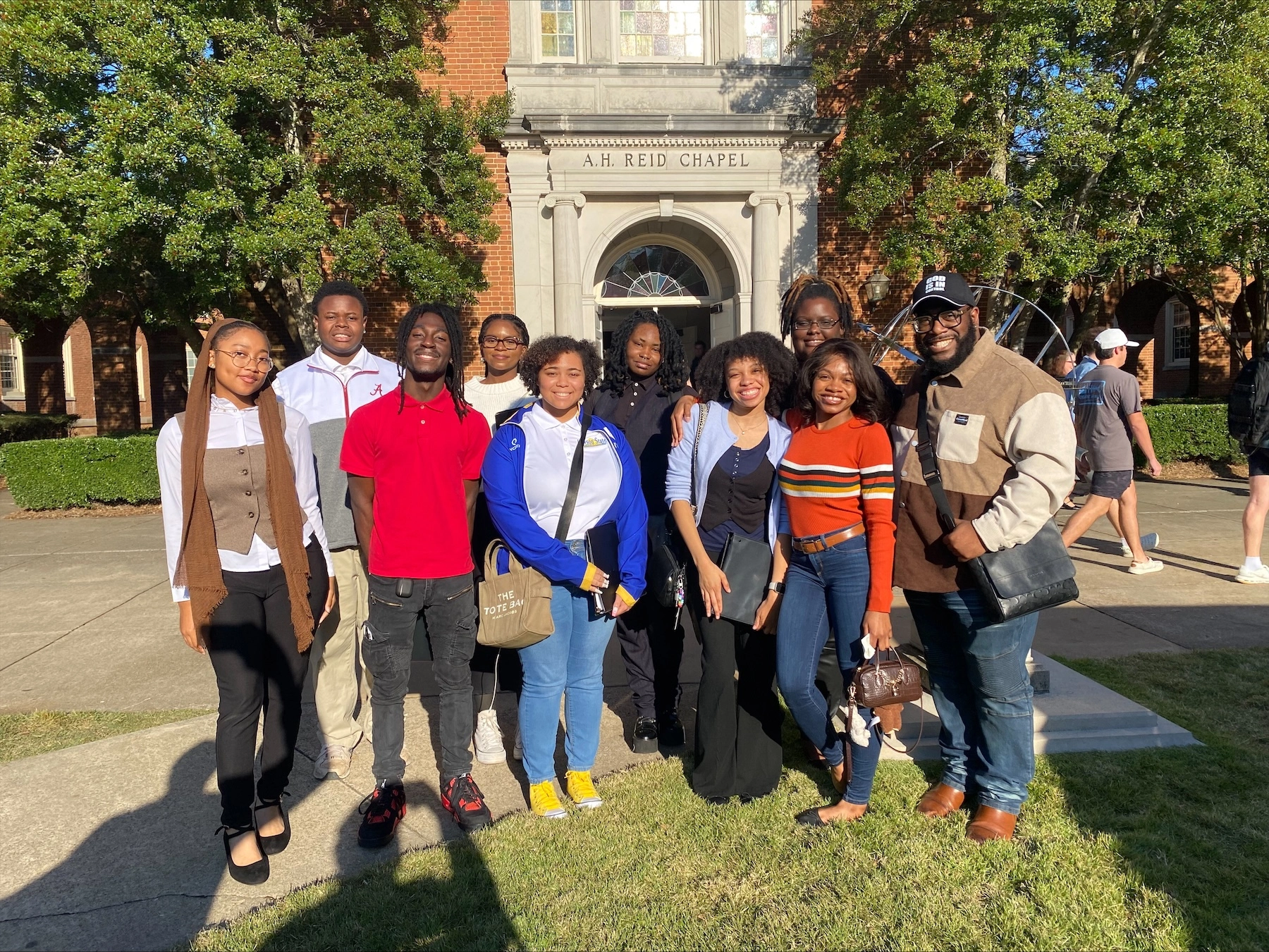 Members of the Lawson State Community College choir pose for pictures on the campus of Samford University