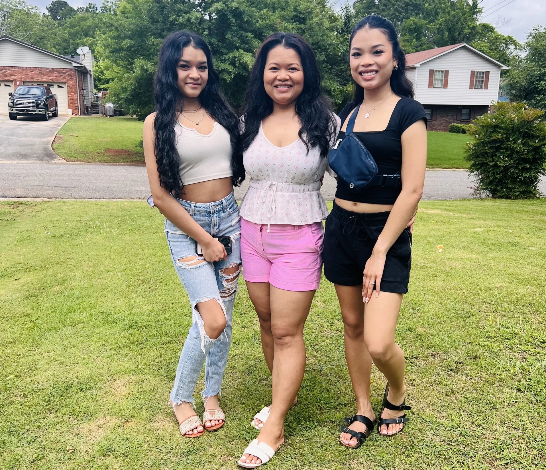 Cathy pon is standing on the grass