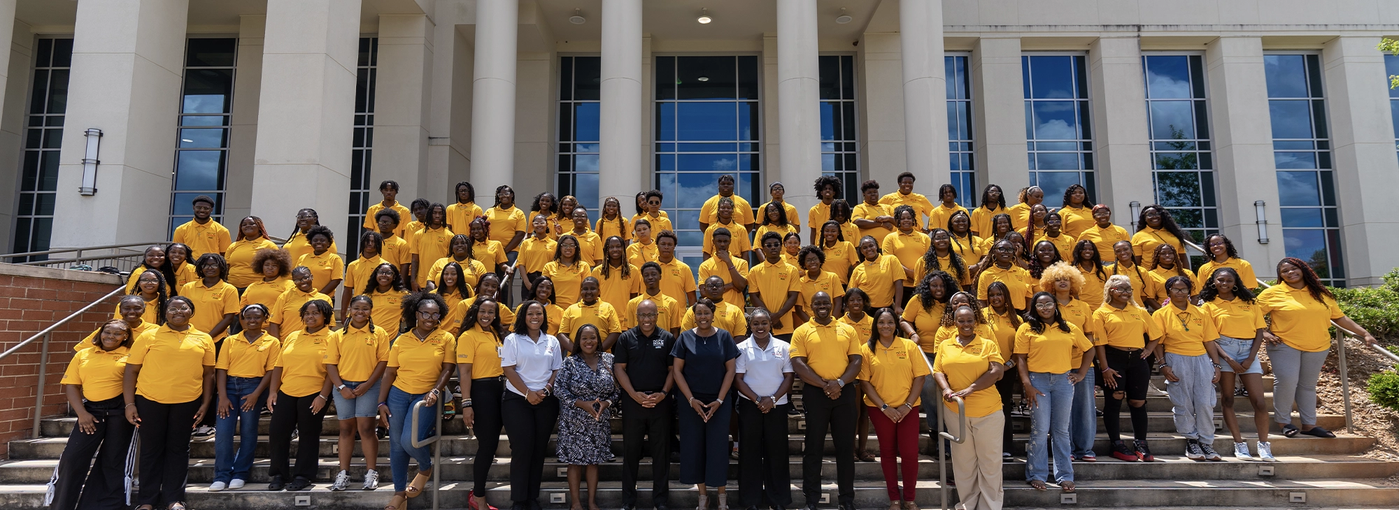 A SOAR student group photo in front of building