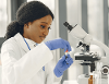 Trainee practices scientific procedures in biotechnician learning lab
