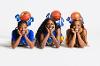Lawson State women's basketball players pose playfully with basketballs during a studio photo shoot.