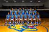 Lawson State women's basketball team poses for a group photo on the court in blue and gold uniforms.