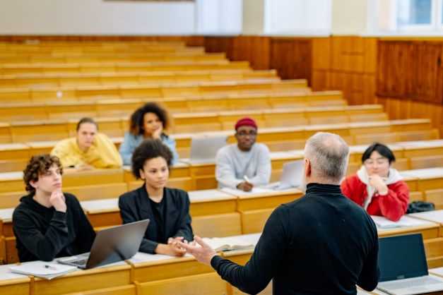 Students in lecture with professor